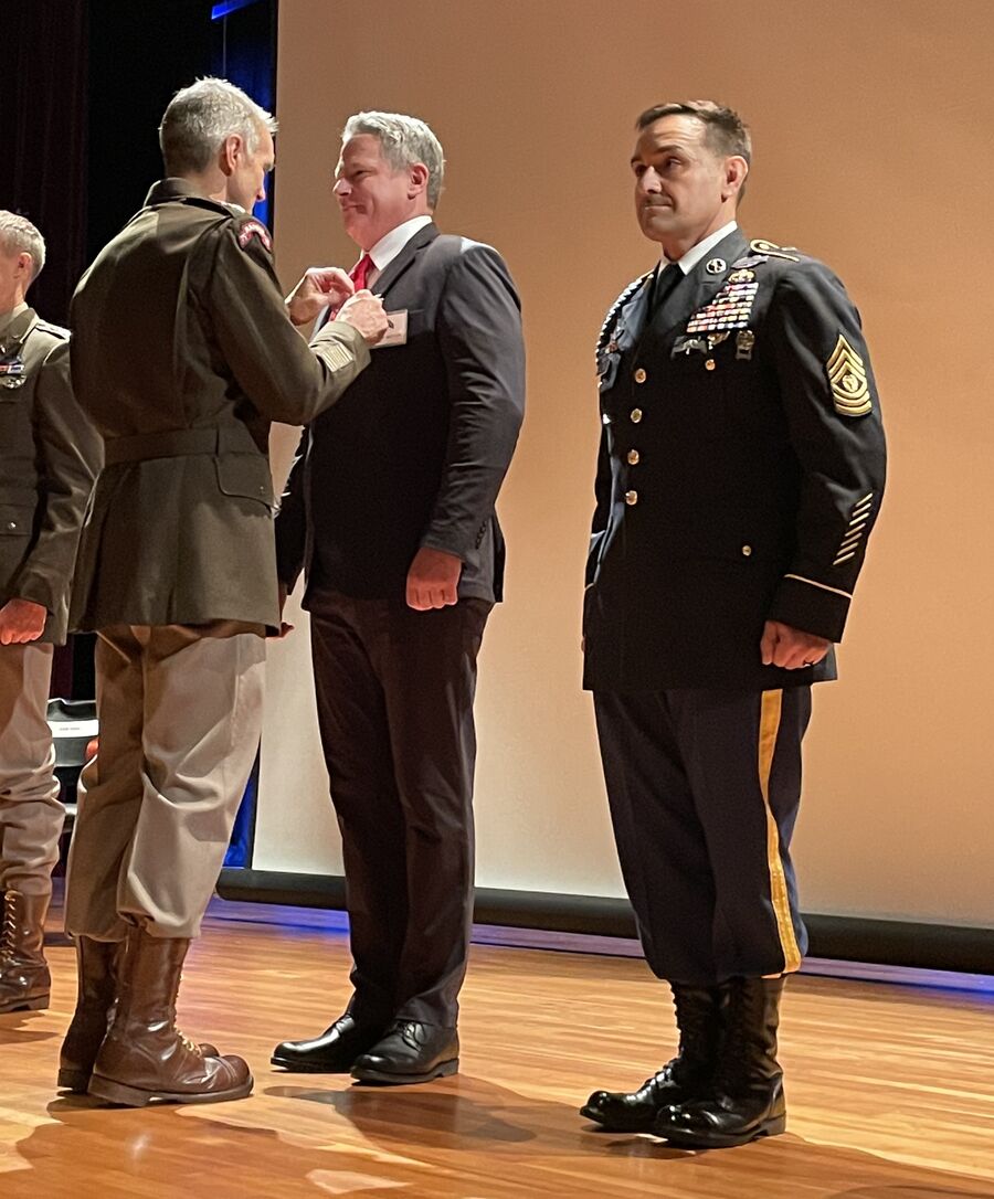 John Belman being presented the Silver Star by an Army general.
